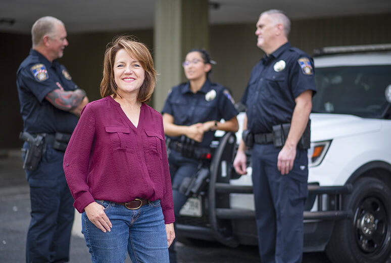 Shannon Bird with police officers